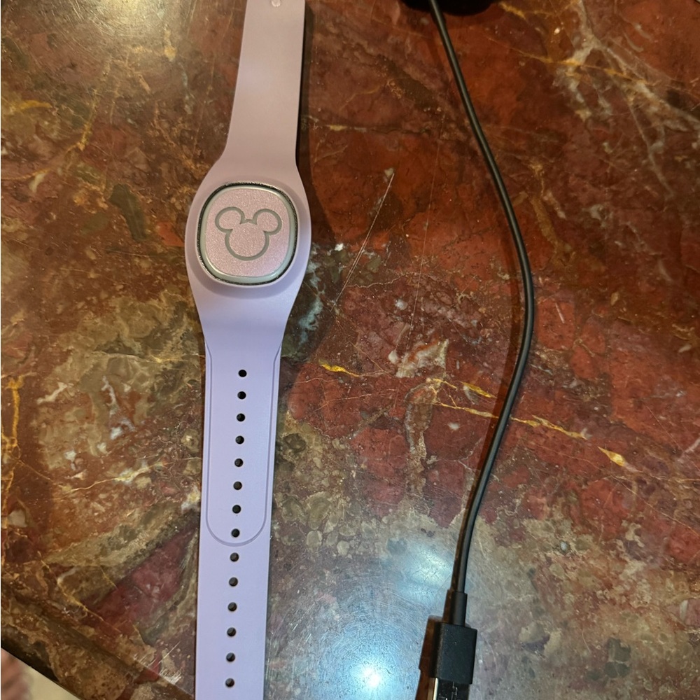 Like new Disney Lavender MagicBand with Mickey Icon